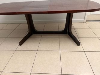 Real rosewood dining table with two extension leaves