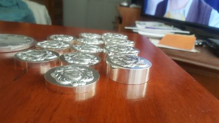 Scottsdale 5oz round coins