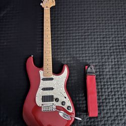 Red squier Stratocaster electric guitar with emg pickups