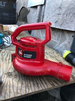 red Toro Power Sweep corded electric leaf