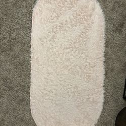 Pink oval area rug