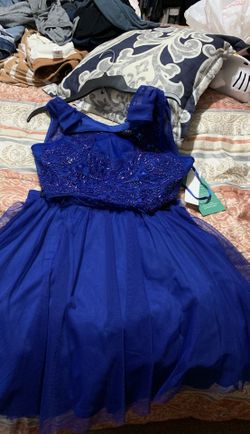 New skirt and shirt blue It’s a two piece. Size l