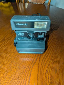Polaroid Camera and Leather Cae