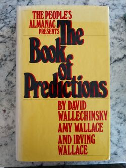 The Book of Predictions signed by author David Wallechinsky with newspaper clip and personal note