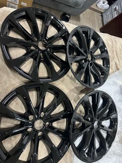 18 Inch Wheel Skins, model XL-118-BL, are designed for 2018-2023 Chevy Traverse models with 18-inch factory alloy wheels matching