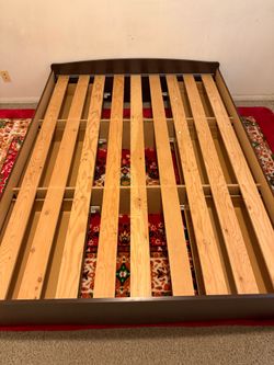 Queen sized bed frame with 6 side drawers