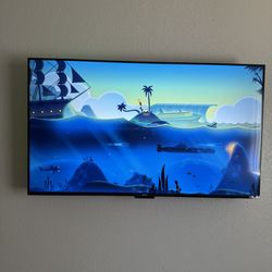 ROKU TV 55” WITH WALL MOUNT + REMOTE
