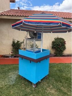 Snow Cone machines and cart $850