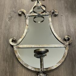 Never Used- Mirrored Wall Sconce.  Weathered Champagne Colored Wrought Iron.  Solid, weights about 8lb.  30h x 18w 