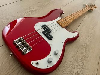 1999 Fender CIJ PB57 US Precision Bass candy apple red.