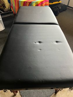 Massage table