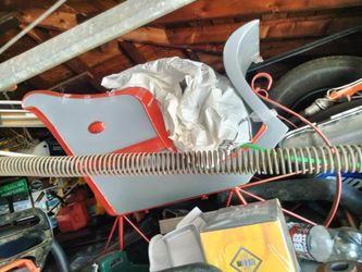 A small Santa sleigh all metal for outdoors for early Christmas