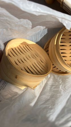 Bamboo dumpling racks approximately 6 inches across.