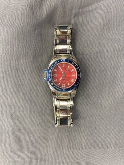 Tommy Hilfiger F90271 Men’s Red Dial Blue Bezel Stainless Steel Quartz Watch
