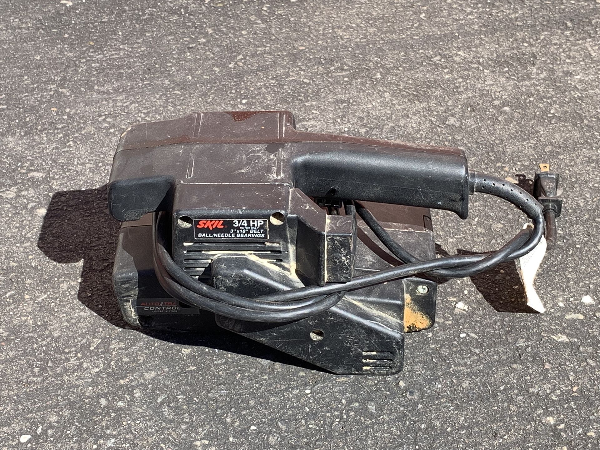 Skil 3x18 belt 3/4 hp sander with auto-trac control