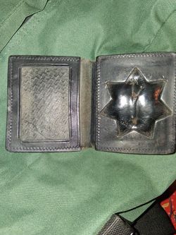 Leather  badge/ wallet holder  with Six point star cutout...$10obo