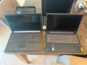 4 Laptops. One does not work