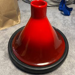 traditional Moroccan tagine, a clay cooking vessel specifically designed for slow-cooking stews