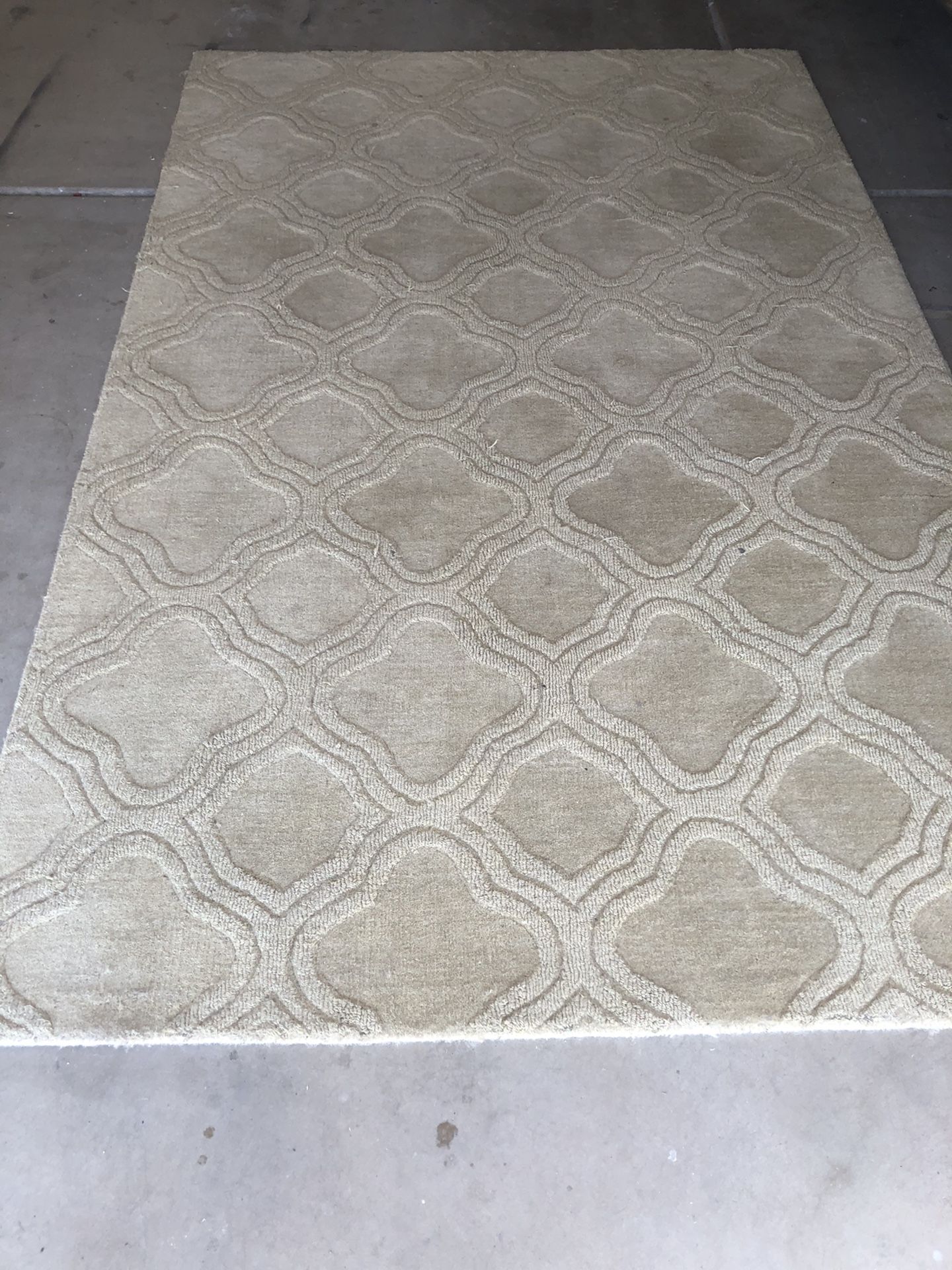 Beige Morocco wool area rug 5’ 3” X 8’ 3” $50.00