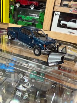 Blue Diecast Ford F-Series Truck with Snow Plow