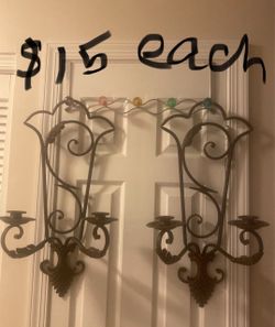 Decorative metal wall candle holders $15 each, cash only. Cross posted