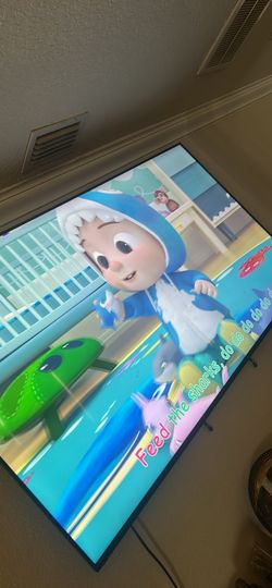 75 Inch Vizio TV w/ the spare legs