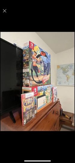 Special Edition Nintendo Switch, Ring Fit Adventure Wheel, 2 Games