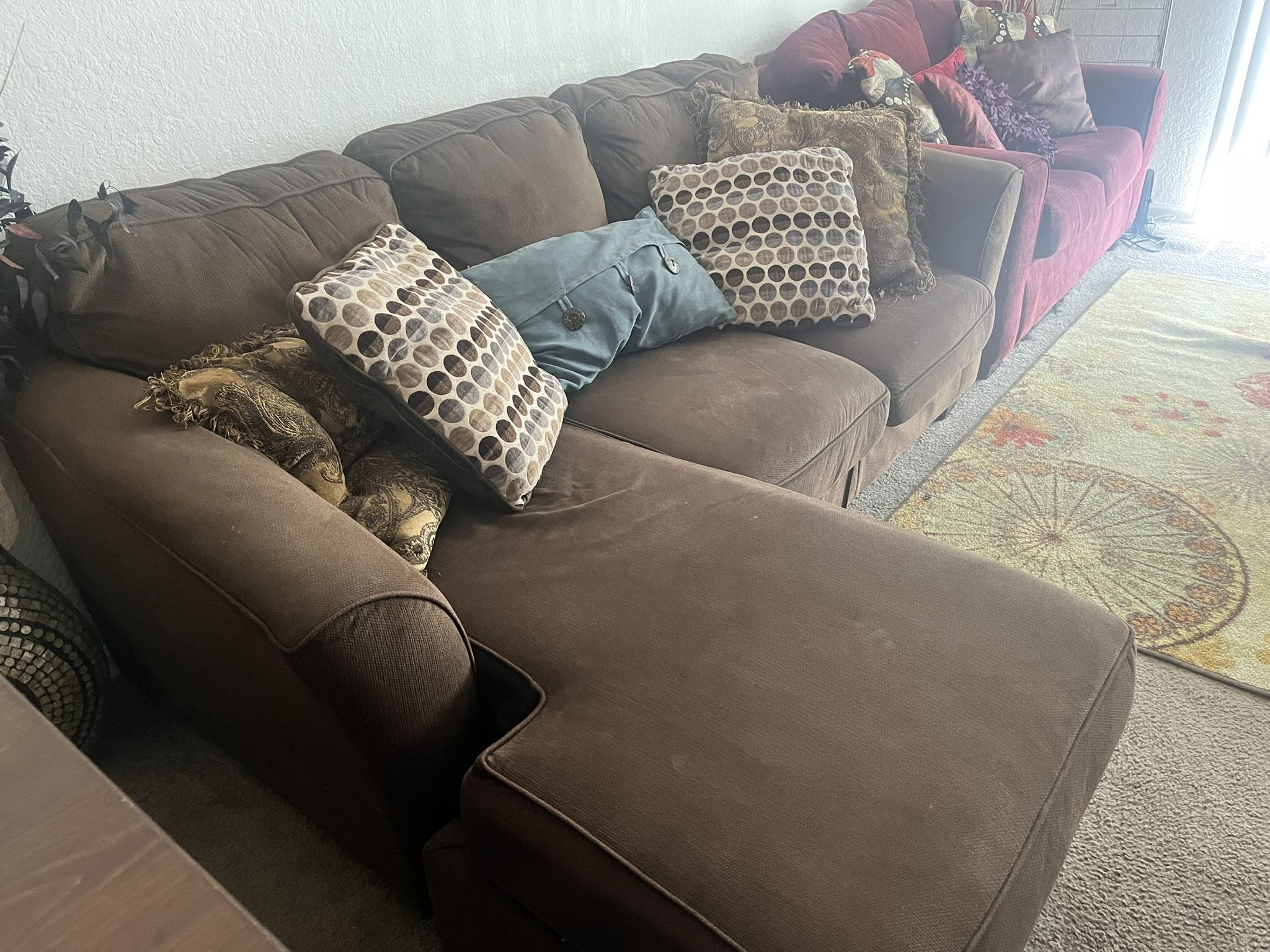 Two Sofas With Pillows