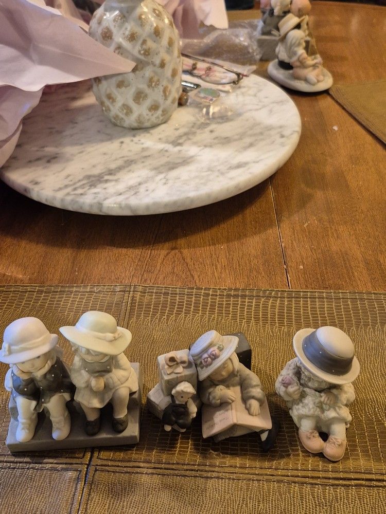 Three Enesco Kim Anderson Porcelain figurines