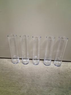 5 Tall glass vases 4x16 all for $60 pickup 3-8:30 pm rainbow/charleston cash only moving sale