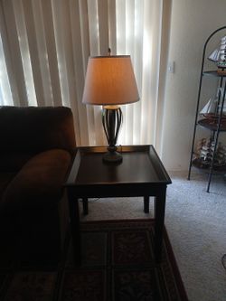 Sofa ,2 tables, armchair.