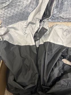 Never worn rain jacket XL