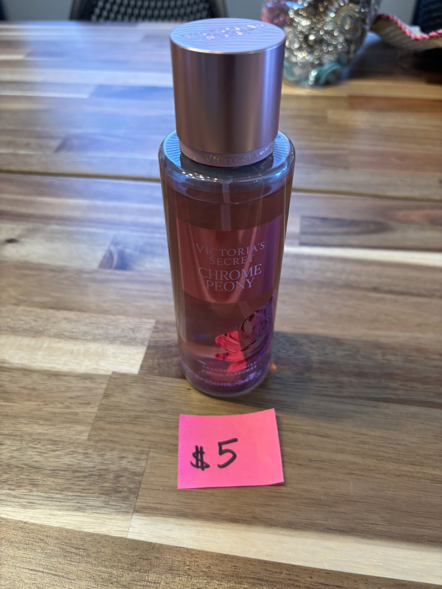Used Victoria secret Chrome Peony 8.4 oz
