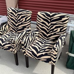 Two Leopard Upholstered Chairs