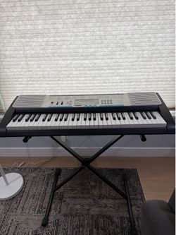 Casio LK-220 Key board with light up keys- FREE STAND