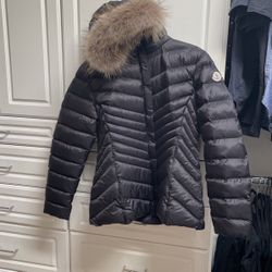 Moncler Black woman’s rain jacket. Size 6 but fits more like an eight or 10