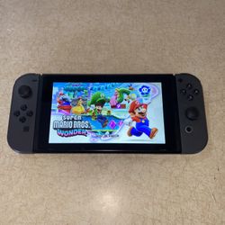 NINTENDO SWITCH + 50 SWITCH GAMES and 7500 RETRO GAMES
