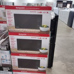 HOT POINT COUNTER TOP MICROWAVE OVEN NEW