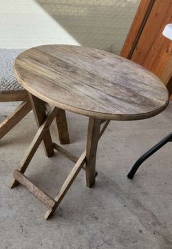 Folding wooden table — compact, convenient, natural wood.