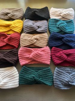 15 turban-style crochet ear-warmer headbands in a wide variety of colors.