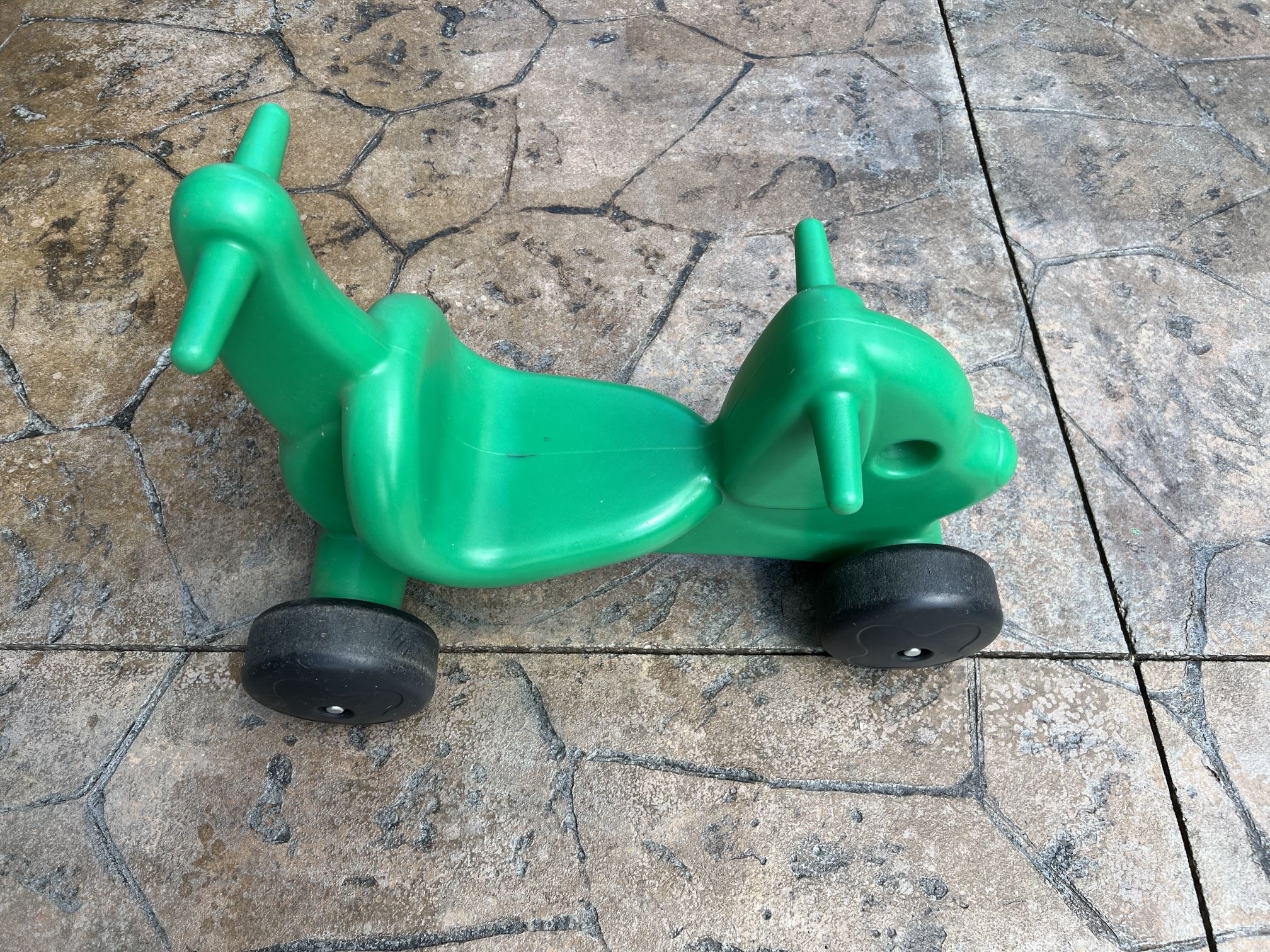 Small Green Plastic Ride On or Push Toy