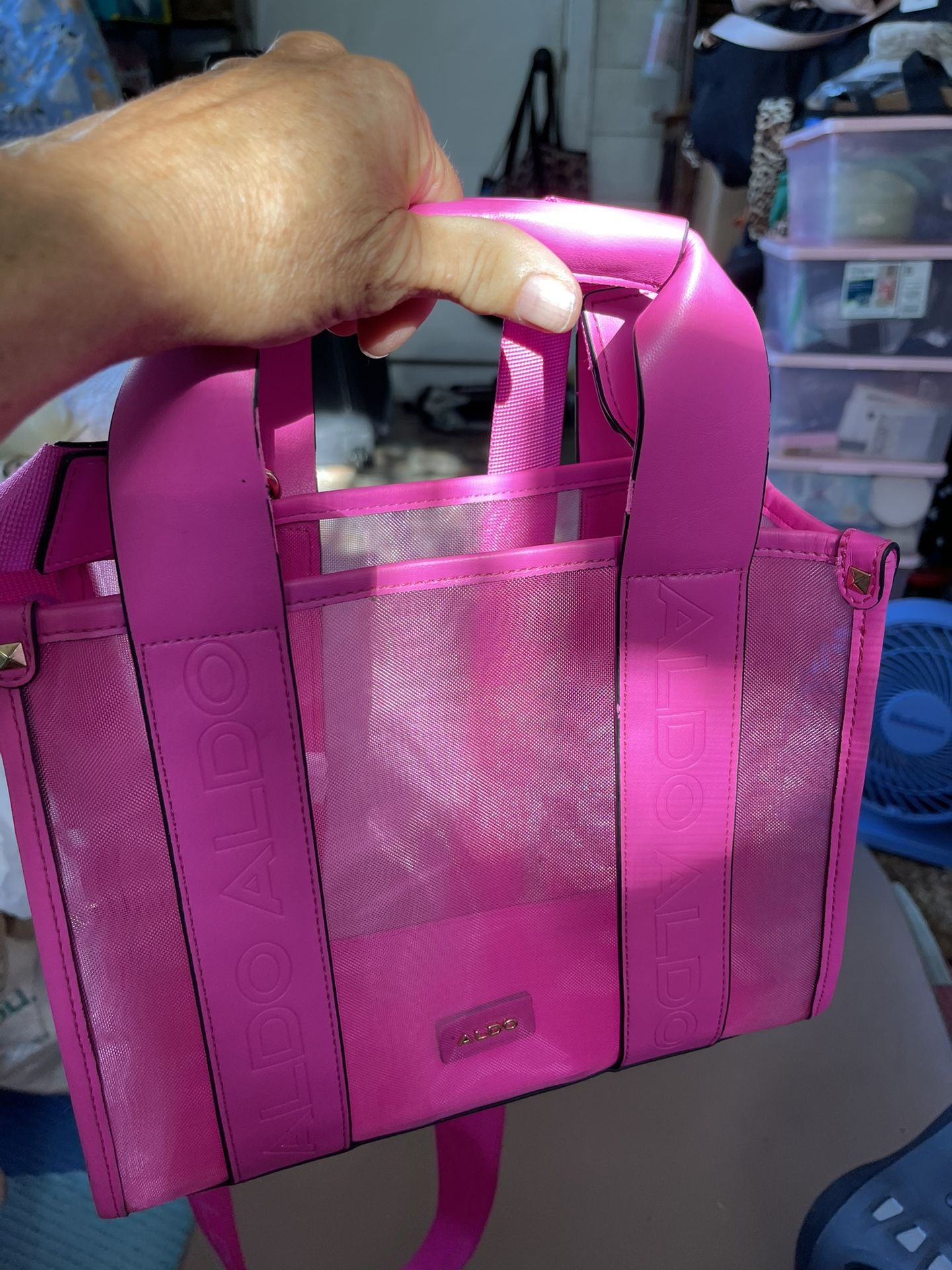 Pink mesh Visible Outside As A Purse Or Has Long Shoulder Straps Made By Aldo