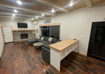 1550 ft.² of pine wood black stain scraped finish flooring at $3.50 per square foot