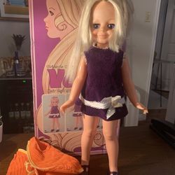 1960s VELVET doll. Hair grows. Includes original box and doll is in great condition includes a retro orange out fit. 38.00. Johanna Buda area. Antique