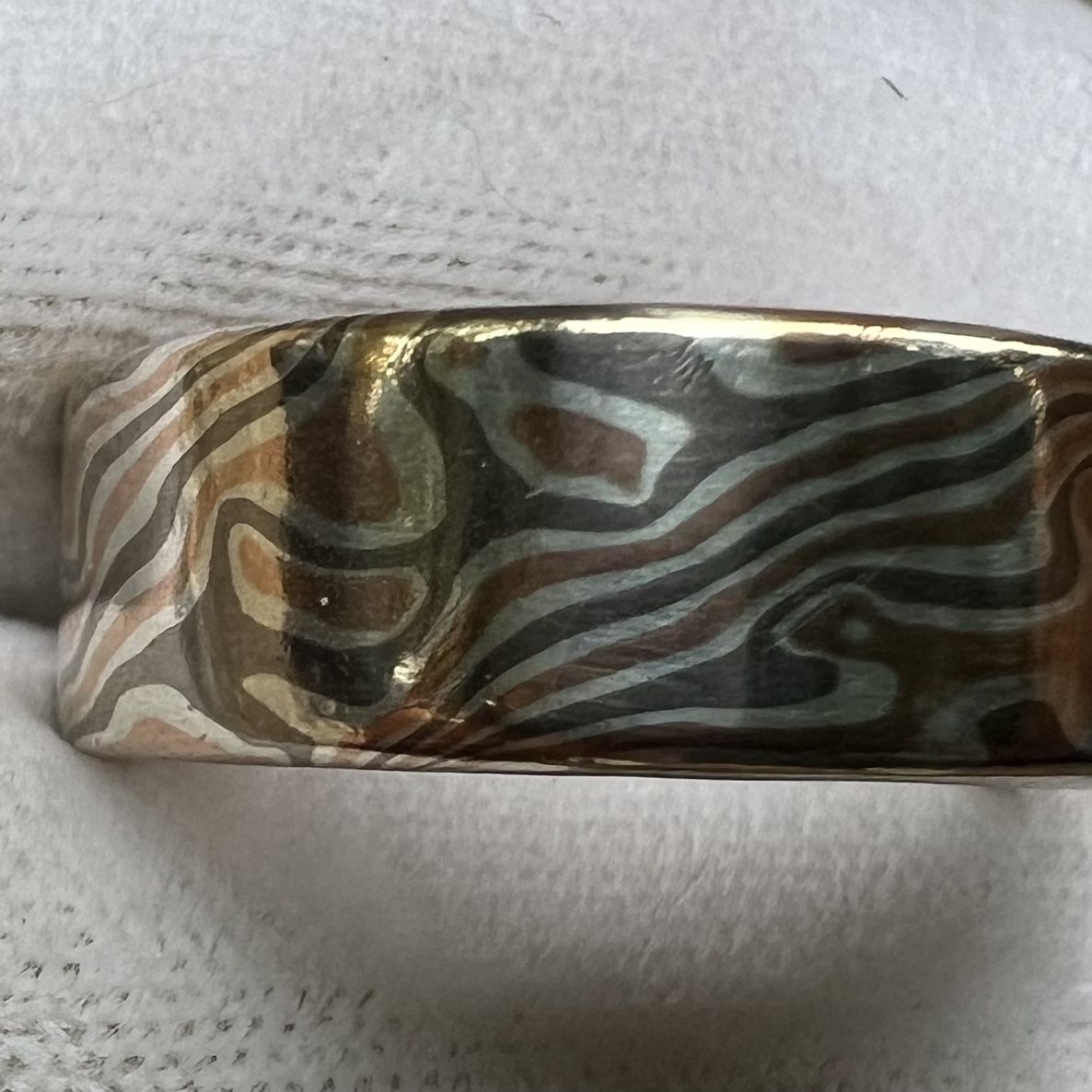 Men’s Wedding Band - Mokume Gane By James Binion.  14K Palladium white gold; 14K red gold; and sterling silver.  Size 11.