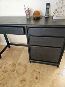 Solid oak desk and black chair