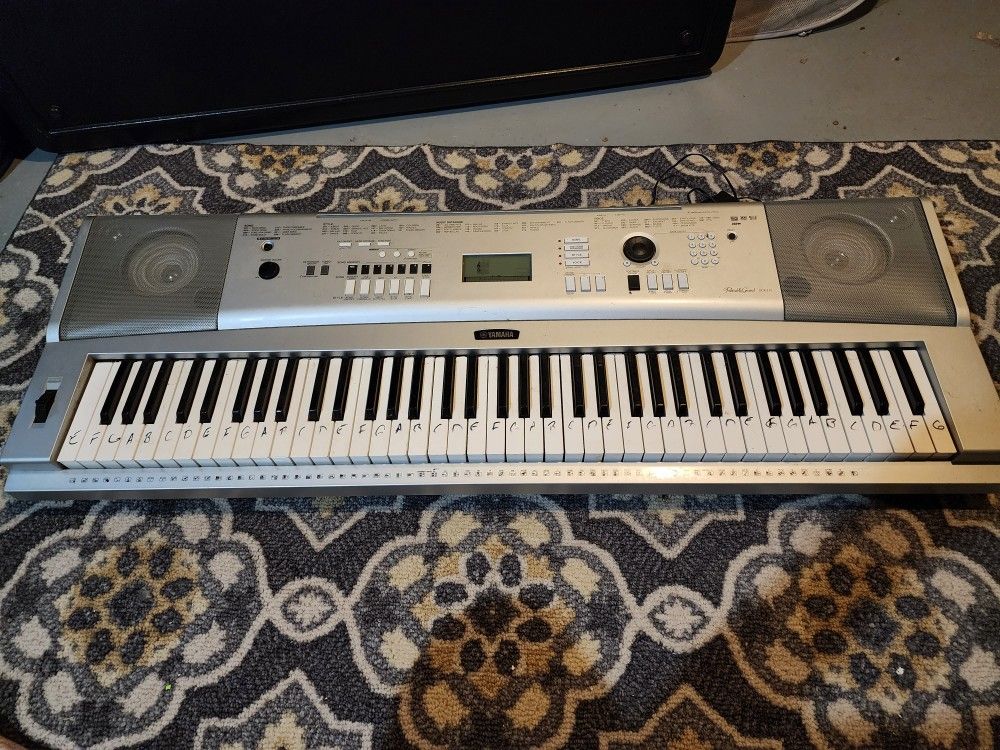 Yamaha DGX-230 76-Key Portable Keyboard With Stand And Power Supply.