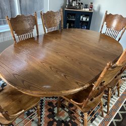 6 Chairs And An Extendable Table