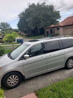 A strong, straightforward title would be:  2010 Honda Odyssey EX-L – Runs Great, Cold A/C – Great Work Van