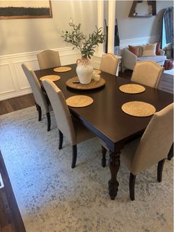 Wood extending dining table and six chairs
